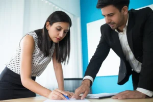 Corporate team discussing emergency CEO replacement and succession planning in office