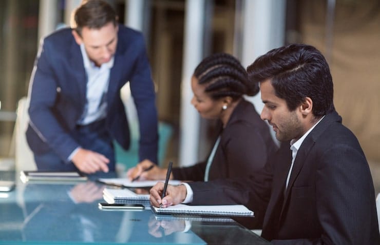team members discussing business strategy